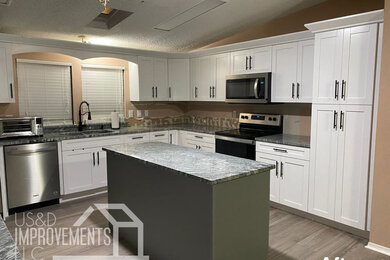 Kitchen Remodeling Tampa - White Cabinets with Granite Island