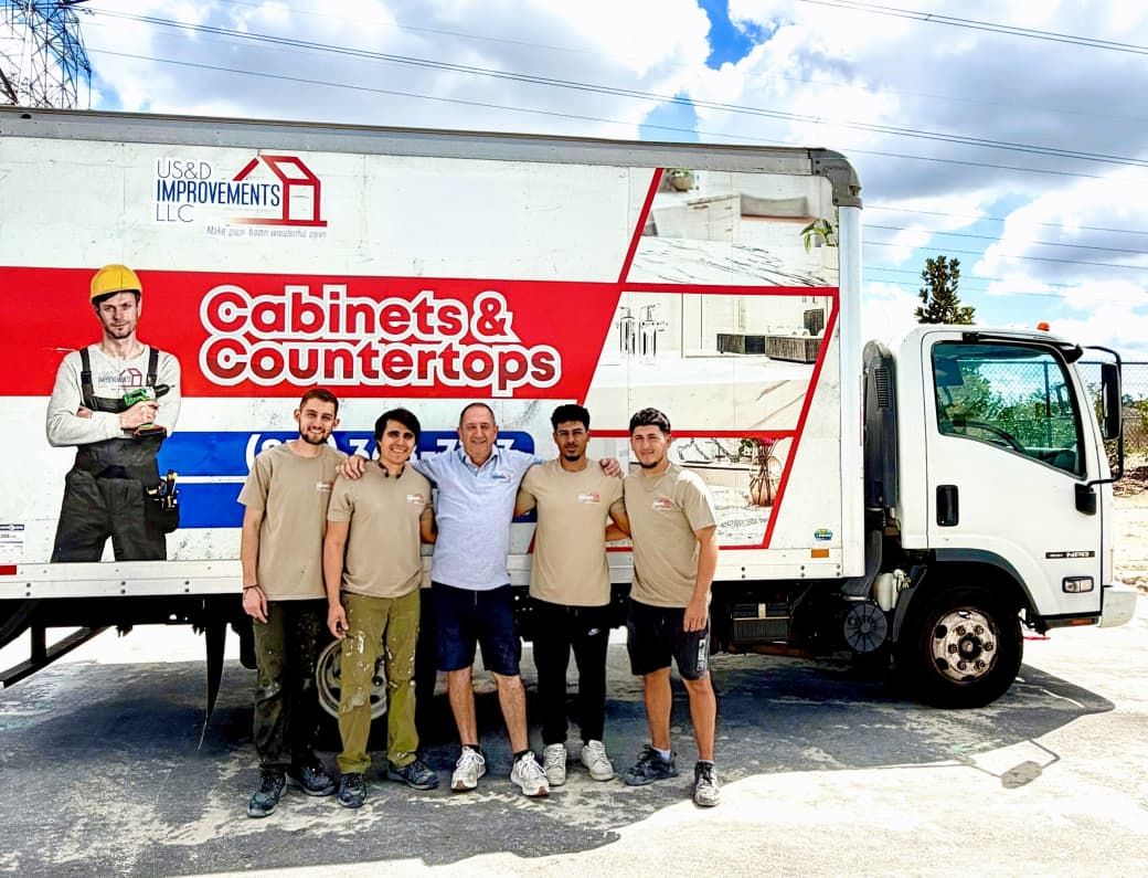 Sebastian and the US&D Improvements team in front of their branded Cabinets and Countertops truck in Tampa Bay